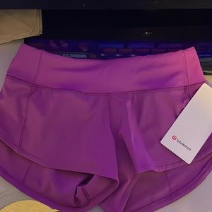 nwt vivid plum speed up shorts